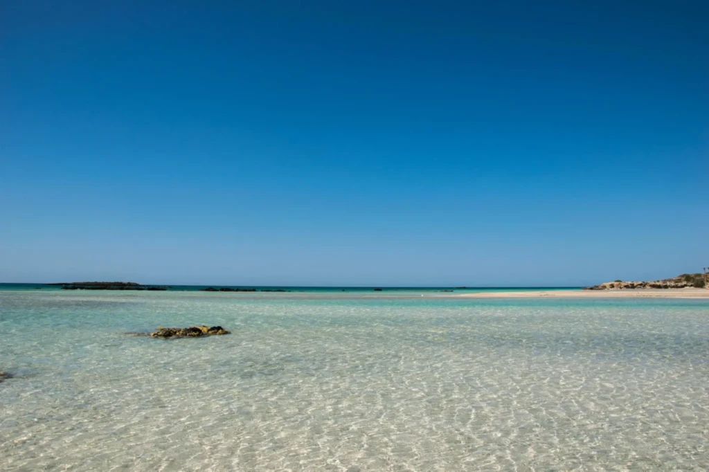 walking through the shallow lagoon-like water